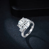FITINY moissanite ring styled on hand against neutral backdrop