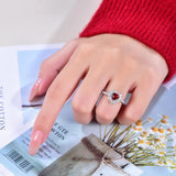 Top-down flat lay of the heart ring showcasing symmetry and polished finish