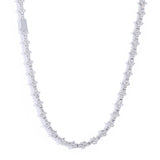 White gold tennis chain bracelet wrapped twice around wrist for alternative wear