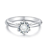 Front view of FITINY solitaire moissanite ring on white background