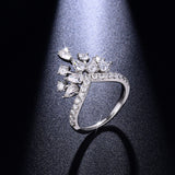 Close-up of D-E color teardrop moissanite with 3EX cut brilliance on white background