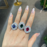 Ring styled on hand against soft neutral fabric, highlighting wearability and modern proportion