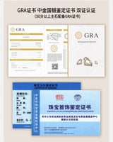 Ring placed beside a small travel journal and passport holder — suggesting travel gifting use