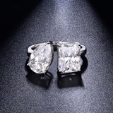 Close-up detail of radiant cut moissanite stones with sharp facets and brilliant sparkle