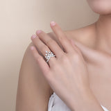 Ring styled on hand with complementary delicate bands — lifestyle stacking example
