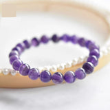Lavender amethyst beaded bracelet on white background, front view