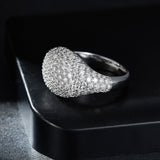 Close-up of full-moissanite stone arrangement and prong settings