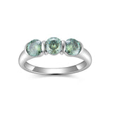 Front view of FITINY blue-green moissanite ring on white background