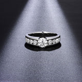 Side profile showing 6.5 mm band width and geometric contour of moissanite ring