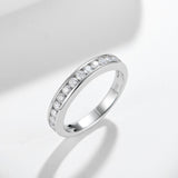 Side profile of sterling silver moissanite ring highlighting smooth band contour and precise stone alignment