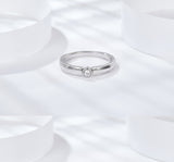 Detail shot of the slightly wider men's ring profile emphasizing structural balance