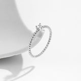 Close-up of heart-shaped moissanite stone highlighting precision cut and sparkle