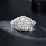 Side profile showing geometric band structure and moissanite stone placement