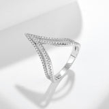 Lifestyle image of the ring worn on hand with neutral-toned outfit and soft natural lighting