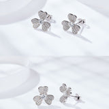 Pair of clover earrings arranged symmetrically in FITINY gift box with ribbon