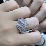 Side profile of gold-plated sterling silver moissanite ring highlighting angular geometric silhouette and smooth band contour