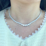 Necklace worn on model demonstrating 35 cm + 10 cm extender fit and layering versatility