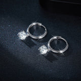 Comparison shot: gold and white gold moissanite hoop earrings side by side