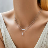 Side angle showing delicate chain and pendant profile