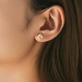 Close-up of micro-pavé cubic zirconia stones on sterling silver square frame