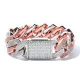 Lifestyle image of person adjusting two-tone necklace in mirror