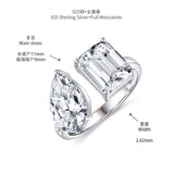 Front-facing view of FITINY emerald-cut moissanite ring in sterling silver on white background