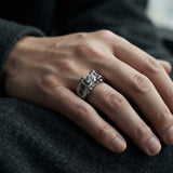 Man wearing the Moissanite Solitaire Ring in 925 sterling silver