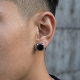 Close-up of Multi Sets of Stainless Steel Magnetic CZ Stud Earrings on ear