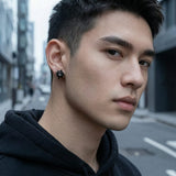 Multicolor Stainless Steel Magnetic 4-Pointed Star CZ Stud Earrings worn by male model – street style