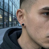 Multicolor Stainless Steel Magnetic Round Stud Earrings worn by male model – street style