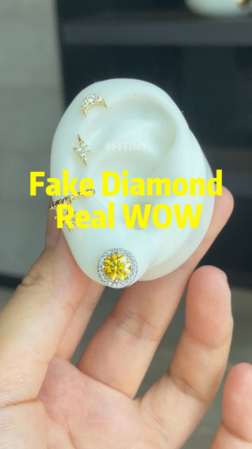 Yellow Halo Stud Earring Shown on an Ear Display