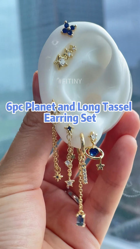 Set de boucles d’oreilles dorées planète et longues pampilles avec pierres bleues