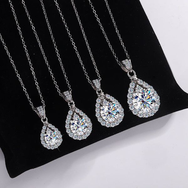 Radiate Elegance: Discover the Moissanite Teardrop Halo Pendant Necklace