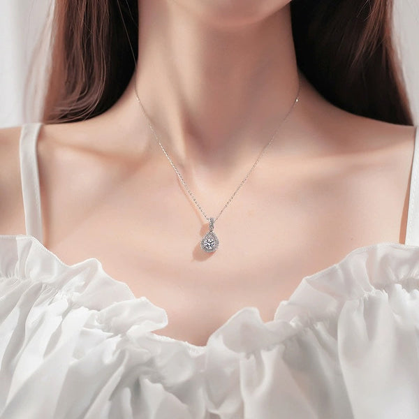 Elevate Your Every Look: Discover the Elegance of the S925 High Carbon CZ Teardrop Halo Pendant