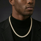 Man wearing the Gold (Width 6mm) iced out tennis chain necklace