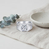 Moissanite Solitaire Ring – 1ct or 2ct Brilliant-Cut White Gold-Plated Sterling Silver Band for Men — lifestyle scene photograph