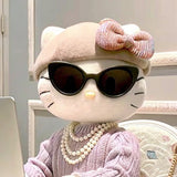 Top-down flat lay with ring centered among minimalist accessories and neutral textures