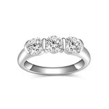 Front view of FITINY three-stone moissanite ring in white gold on white background