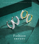 Back view showing secure friction-back closure and smooth metal finish