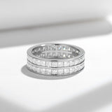 Close-up of 2mm princess-cut moissanite stones with precise 3EX cut and brilliant fire