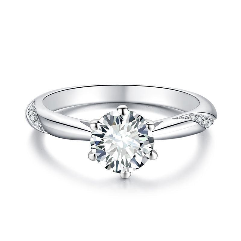 Front view of FITINY solitaire moissanite ring on white background