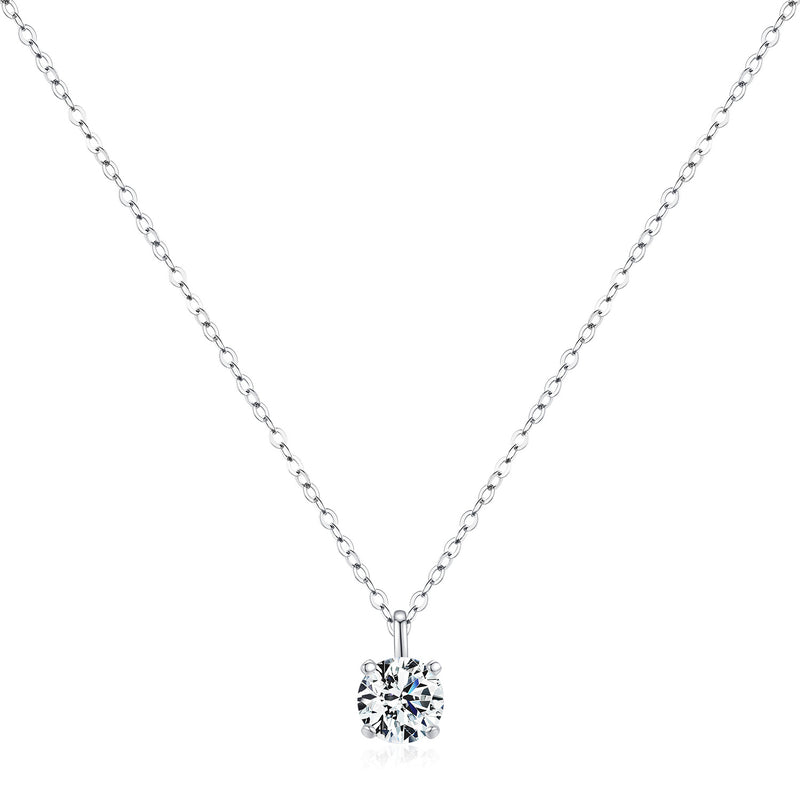 Lifestyle image of necklace worn on model's collarbone with neutral knit top
