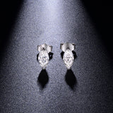 Side profile view showing 4mm x 8mm oval stone dimensions and delicate leaf-shaped backing
