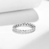 Side angle detail showing U-shaped band curvature and triple-ring stacking alignment