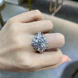 FITINY moissanite ring styled on hand against neutral linen backdrop