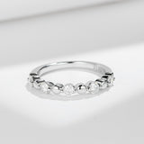Stacked styling: Bubble Stack Ring worn alongside two thin plain bands on model's hand
