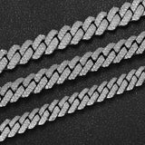 Gold Cuban chain necklace shown with denim jacket and chain pendant