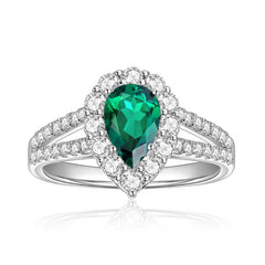 Front view of FITINY teardrop cultured emerald ring with moissanite accents on white background