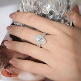 Close-up of 2.0ct marquise moissanite center stone with fire and clarity