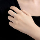 Close-up of U-shaped open band ring R3-0570 showing smooth sterling silver finish and flexible gap